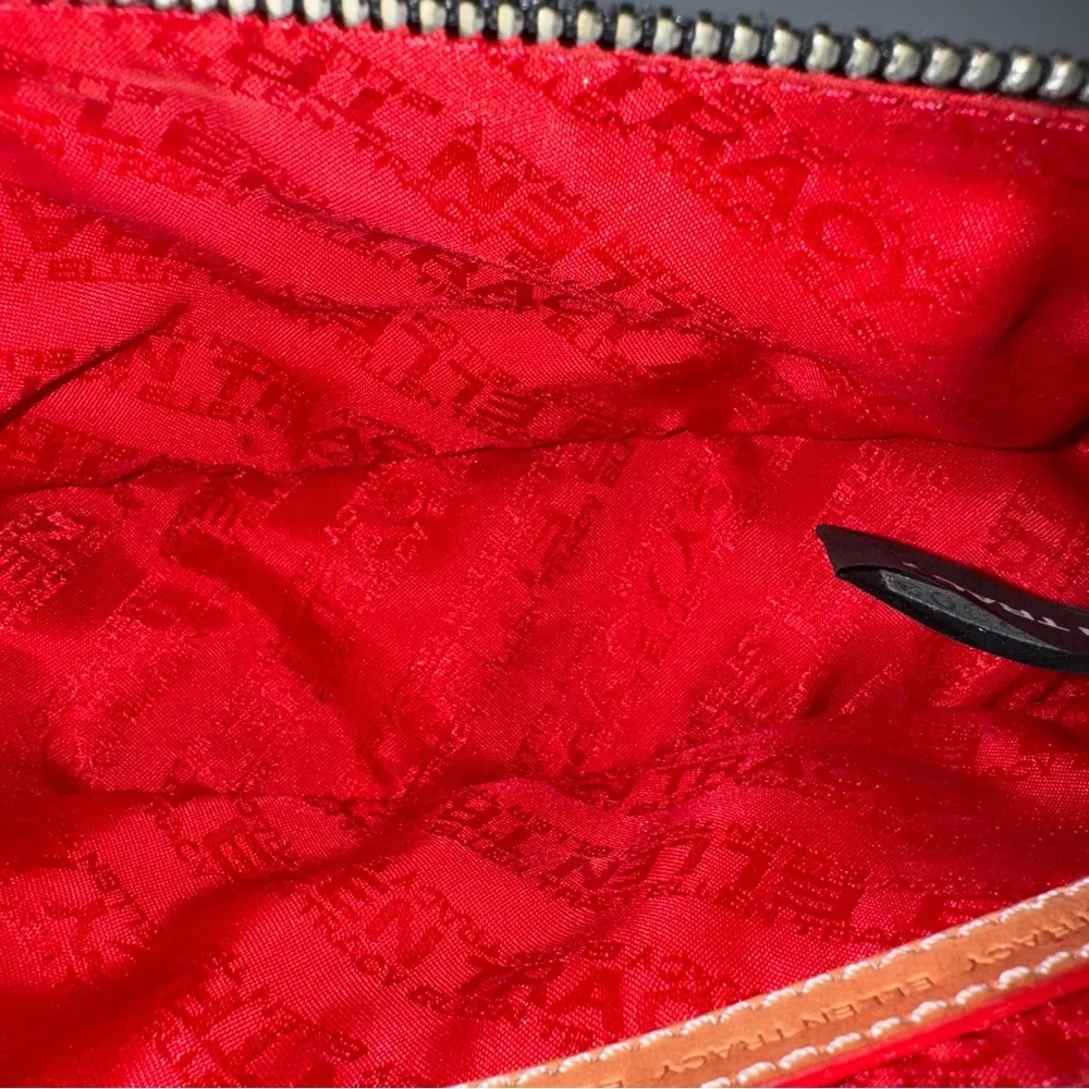 Ellen Tracy Black Leather Clutch with red logo interior.